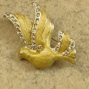 Monet gold tone dove brooch